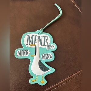 Disney “Mine” teal seagull luggage tag